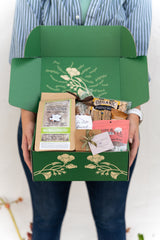 Woman holding Santa Barbara Favorites Bundle 