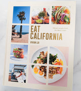 Cover of Eat California: Vibrant Recipes from the West Coast, featuring a grid of photos—palm trees, food dishes, a beach scene, and a person by a van. Text highlights vibrant West Coast recipes and California food culture.