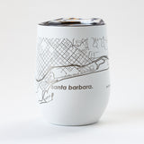 The Map of Santa Barbara Insulated Wine Tumbler is a white, stainless steel tumbler with a silver lid and a minimalist city map design featuring street names like Cabrillo Blvd—ideal for those who love chic, insulated drinkware.