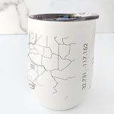 The Map of the San Diego Insulated Wine Tumbler is a white stainless steel mug with a clear lid, minimalist engraved map design, and vertical coordinates 32.731 -117.152—an ideal San Diego gift.