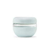 The Porter Seal Tight Bowl - Mint is a small, round, light blue container with a matching lid and clear band, eco-friendly in design, shown on a plain white background.