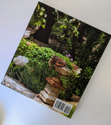 The book "Private Gardens of Santa Barbara: The Art of Outdoor Living" features a cover photo by Margie Grace with a stone planter of succulents and flowers, resting on a white surface with the barcode at the bottom right.