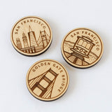 The San Francisco Trolley Wood Magnet is crafted from sustainably harvested wood and features a classic cable car with its location name, celebrating one of the city's iconic landmarks.