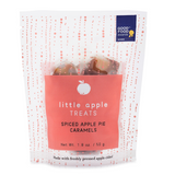 A white and red pouch of Spiced Apple Pie Caramels, winner of a Good Food Award, made with freshly pressed Sonoma County apples for an authentic caramel apple pie flavor.