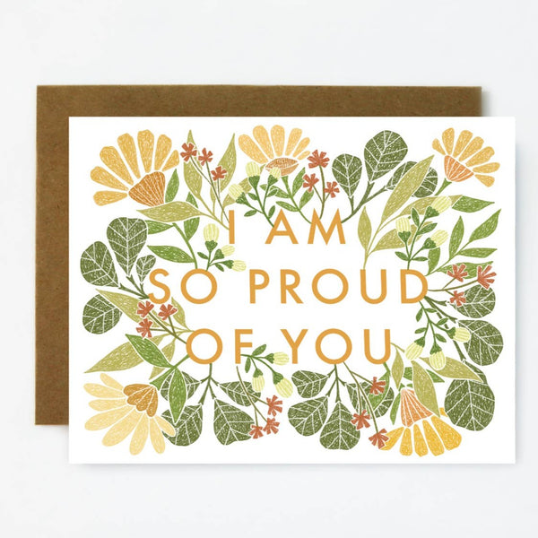 Outside of card reads "I am so proud of you" surrounded by a flower and leaves design