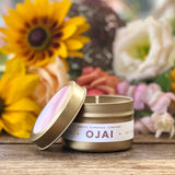 Ojai candle with floral background