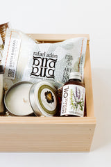 Renewal Gift Box closeup - Rafael adon soap, Cabana candle & Grapeseed co. bath + massage oil