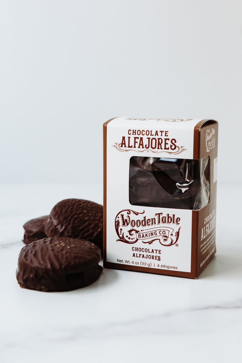 Chocolate Alfajores Box with cookies alongside it